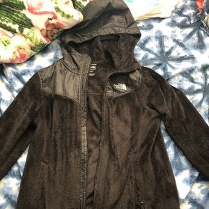 black fuzzy north face jacket